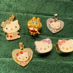Hello Kitty Gold and Pink Charm Collection
